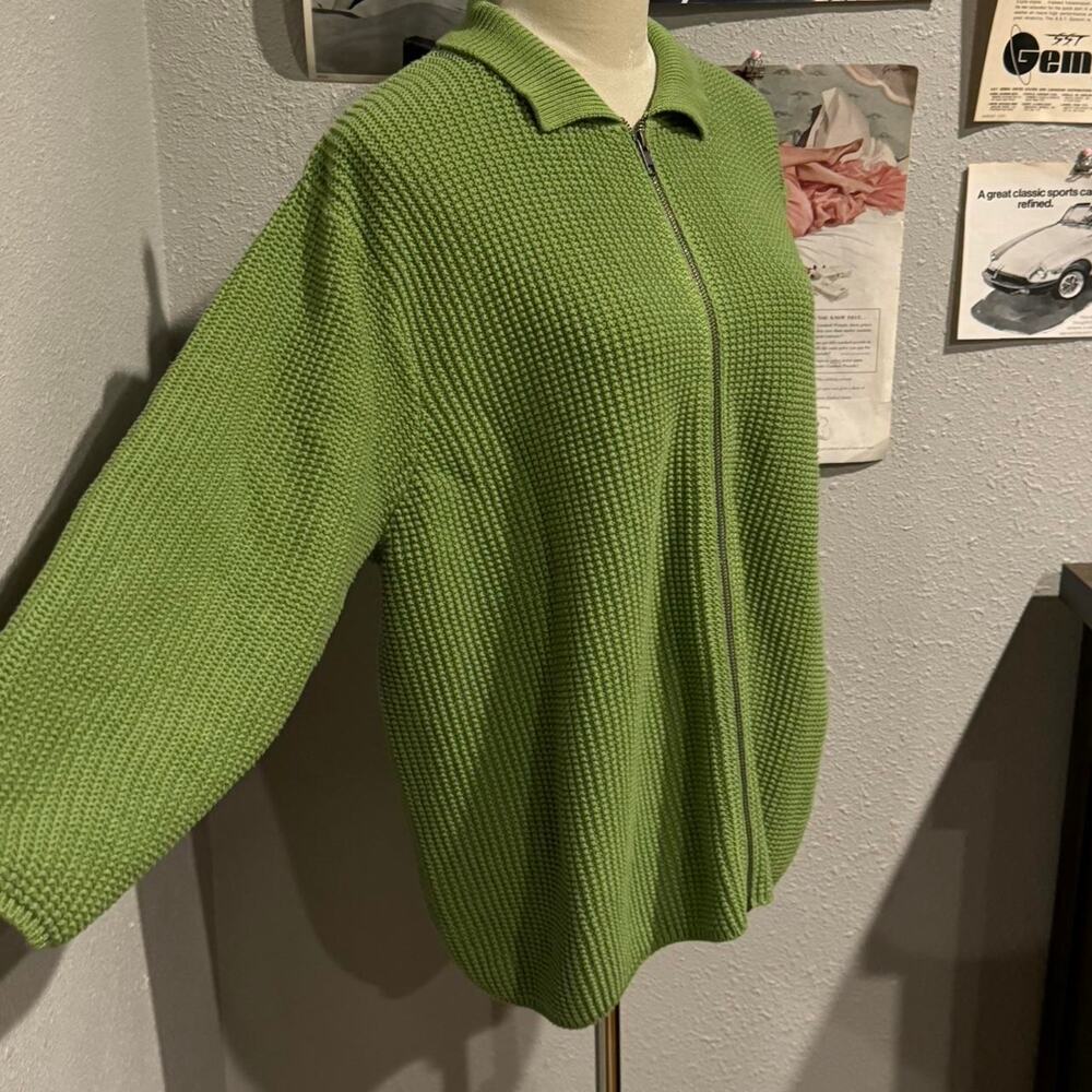 Green knitted zip up sweater